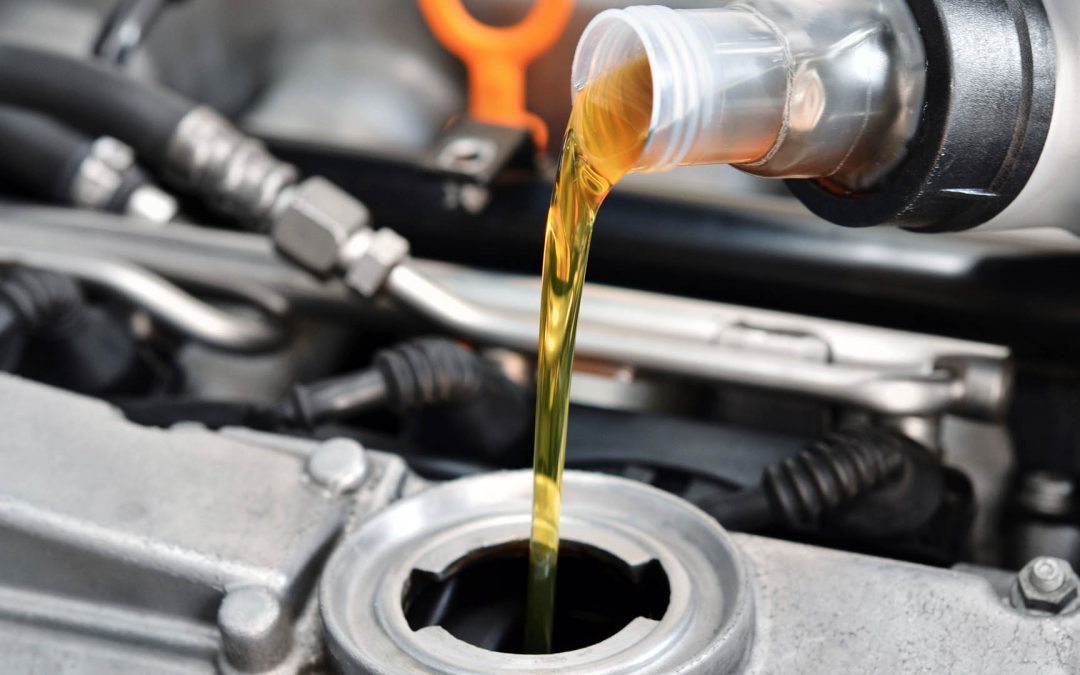 Oil change being carried out during a car service